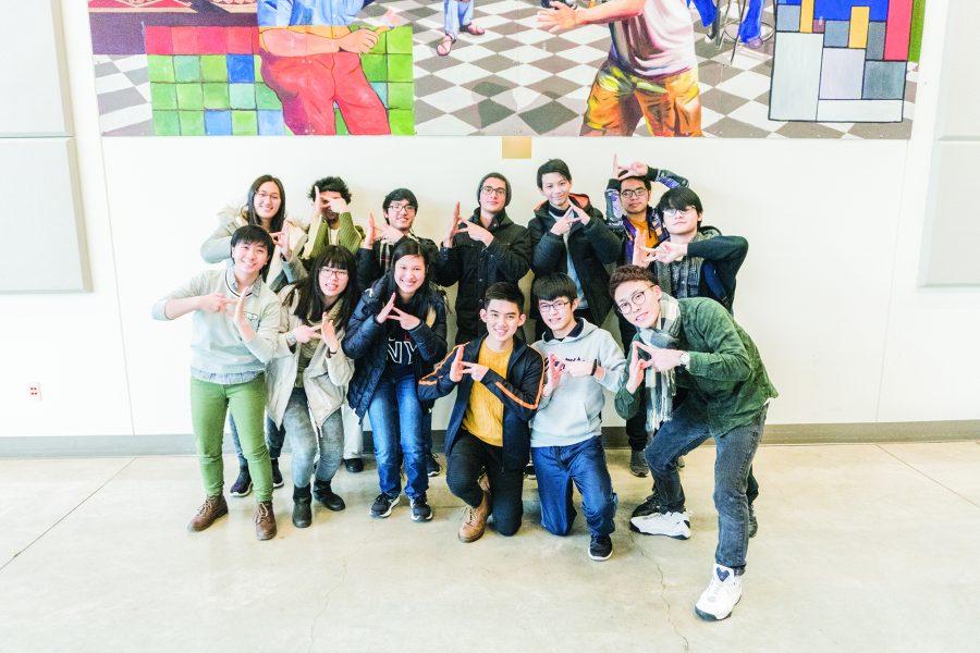 YouToo club shows o  the o icial "YouToo" sign. Back from left: Qin Wang, Luke Stout, Khoa
Hoang, Brandon Gonzalez Villalobos, Justin Jeremiah Jap, Minh Thuong Nguyen, Nguyễn Đăng Huy. Front from left: Yuen Ching Li, Mina-yuen Lee, Clara Nathania Lontoh, Brian Thomas, Showtaroh Yanagawa, Chai-Wei Hsu.