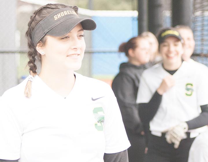 Hope Lawrence watches her teammate pitch.