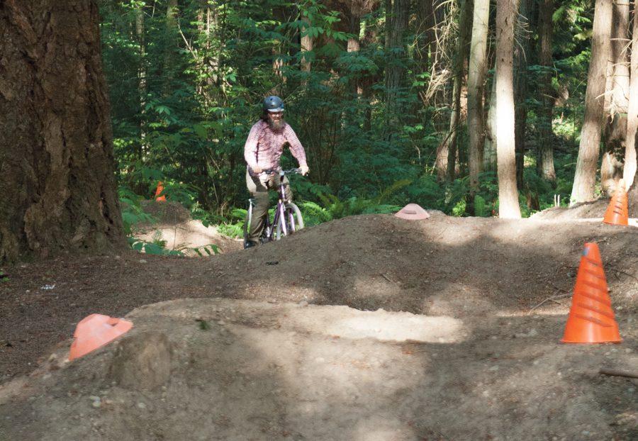 An unauthorized bike trail is damaging SCCs restoration area.