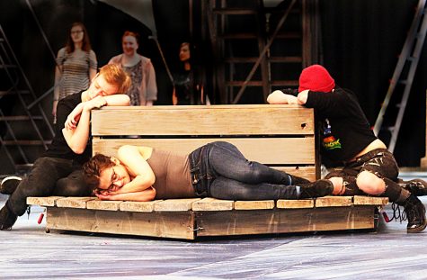Dan Davis (left), Isabel Zyla (center) and Juliana Marasco (right) rehearse a peaceful scene from