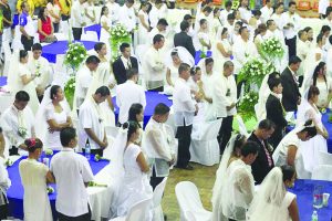 More than 80 couples join the mass wedding at Mandaue City, Cebu. A lot of couples avail of mass weddings because it is cheaper as it is usually sponsored by the city government like this one here. (Cheryl Baldicantos)