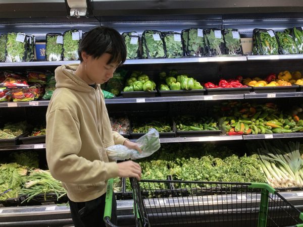 Tony Chen browses the produce section at Asian Family Market.
