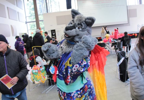 A person in a wolf costume at the lunar new year celebration.