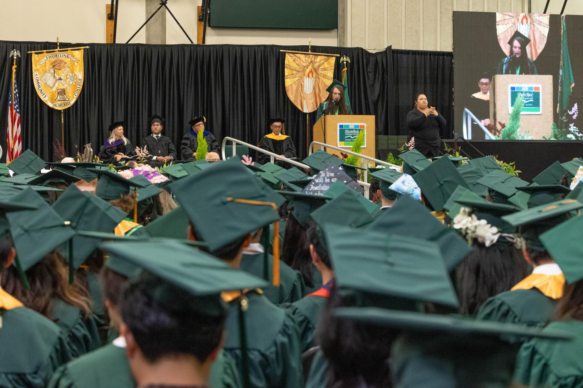 Student speaker Avery Jaye addresses fellow graduates at the 2025 commencement ceremony.